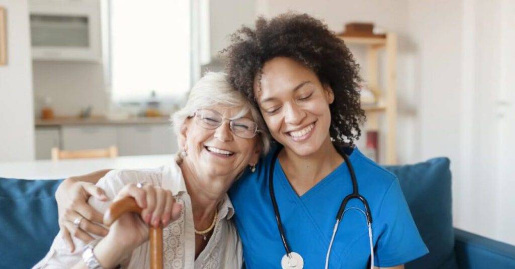 Happy patient with smiling female doctor