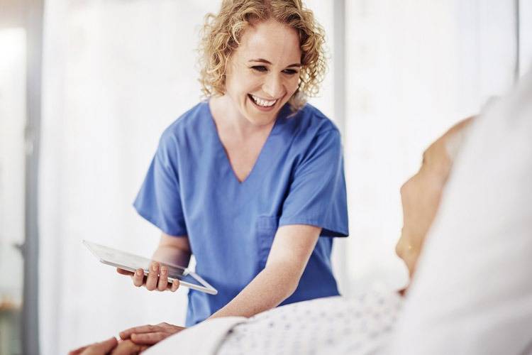 Female nurse with male patient