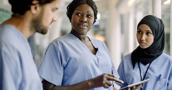 three BIPOC healthcare professionals collaborate