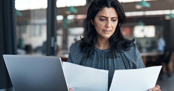 woman reviewing charts